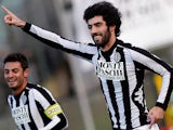 Siena's Luis Carlos Neto celebrates after scoring the opener against Roma on December 2, 2012