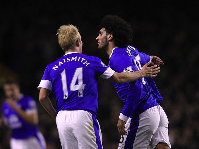 Marouane Fellaini celebrates scoring the first-half equaliser for Everton on November 28, 2012