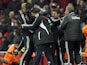 Michael Laudrup celebrates with his coaching staff after going 2-0 up against Arsenal on December 1, 2012