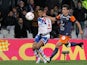 Lyon's Michel Bastos and Montpellier's Marco Estrada battle for the ball on December 1, 2012