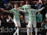Mikael Lustig celebrates with team mates after scoring his team's second goal against Hearts on November 28, 2012