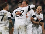 Mainz players celebrate after Nikolce Noveski scores on November 27, 2012