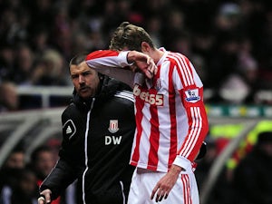 Peter Crouch loses two teeth