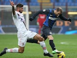 Inter Milan's Rodrigo Palacio and Palermo's Eros Pisano battle for the ball on December 2, 2012
