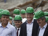 Brazil legend Ronaldo with members of the FIFA World Cup organising committee at the Maracana Stadium ahead of construction work on November 26, 2012