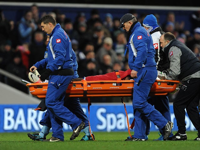 Mbia stretchered off with neck injury
