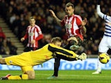 Sunderland's Steven Fletcher has his shot saved by QPR's Robert Green on November 27, 2012