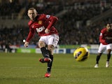 Wayne Rooney strikes again to score his second goal of the match against Reading on December 1, 2012