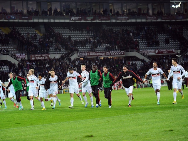 AC Milan players celebrate following a win over Torino on December 9, 2012