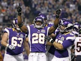 Vikings back Adrian Peterson celebrates his first touchdown of the night against the Bears on December 9, 2012