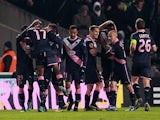 Cheick Diabate is congratulated by team mates after scoring his second goal against Newcastle on December 6, 2012