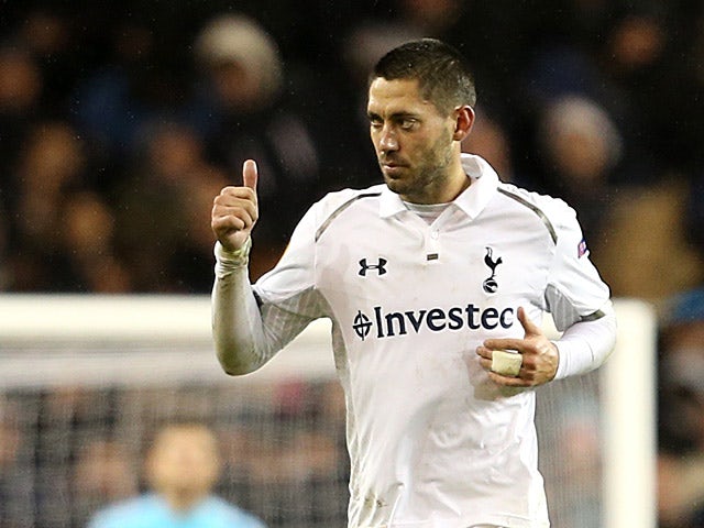 Tottenham's Clint Dempsey celebrates scoring his team's second goal on December 6, 2012