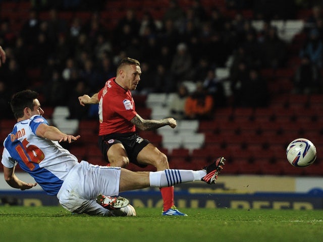 Cardiff's Craig Bellamy fires the ball in against Blackburn on December 7, 2012