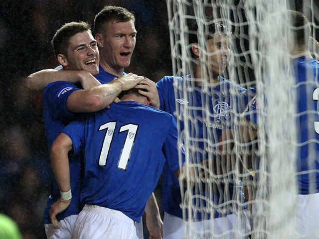 Rangers' David Templeton is congratulated by team mates after scoring his team's opening goal on December 8, 2012