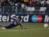 Anderlecht's Dieudonne Mbokani scores against Malaga on December 4, 2012