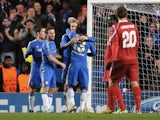Chelsea players congratulate Fernando Torres after a rare goal on December 5, 2012