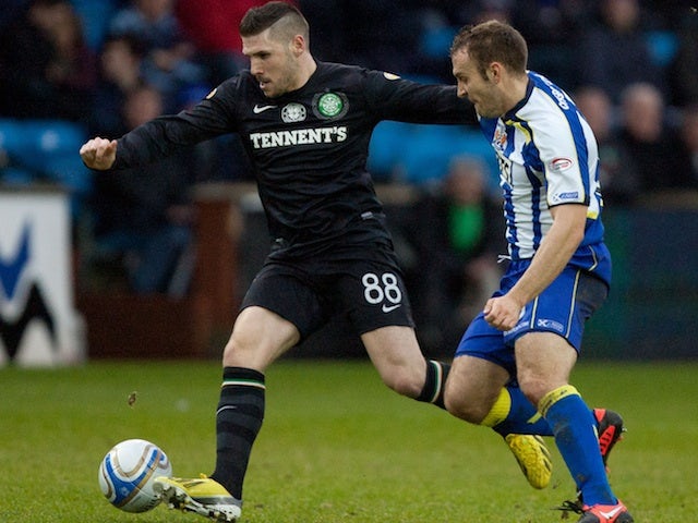 Celtic's Gary Hooper shields the ball on December 8, 2012