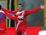 Catania's Gonzalo Bergessio celebrates after his strike against Siena on December 9, 2012