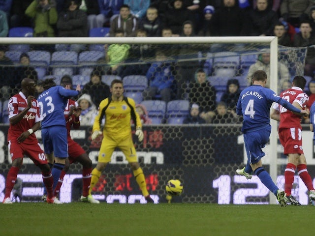 James McCarthy opens the scoring for Wigan on December 8, 2012