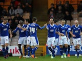 Chesterfield's James O'Shea is congratulated by team mates after scoring the opener on December 8, 2012