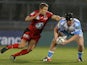 Toulon's Johnny Wilkinson attempts to hold back Sale's Ross Harrison on December 8, 2012