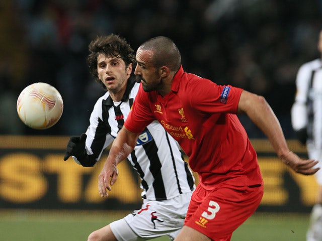 Liverpool's Jose Enrique and Udinese's Diego Fabbrini battle for the ball on December 6, 2012