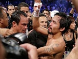 Juan Manuel Marquez and Manny Pacquiao in the ring after the fight on December 9, 2012