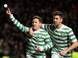Celtic's Kris Commons celebrates his winning penalty on December 5, 2012