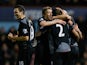 Glen Johnson is congratulated by team mates after scoring the opener on December 9, 2012