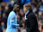 Mario Balotelli looks towards manager Roberto Mancini as he is substituted in the Manchester derby on December 9, 2012