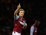 Mark Noble celebrates scoring his penalty to equalise against Liverpool on December 9, 2012