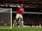 Mikel Arteta celebrates his second penalty against West Brom on December 8, 2012