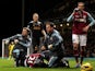 Mohamed Diame lays on the floor injured as a stretcher is called on December 9, 2012