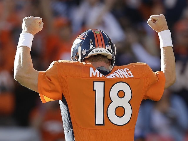 Peyton Manning of the Denver Broncos celebrates on December 2, 2012