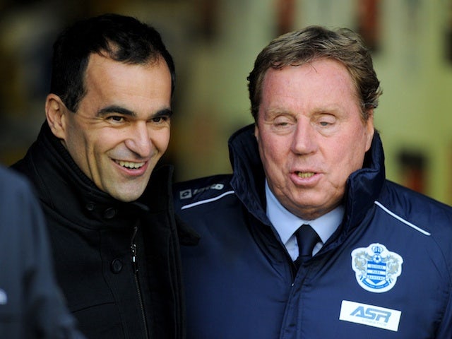 Managers Roberto Martinez and Harry Redknapp before the game between Wigan and QPR on December 8, 2012