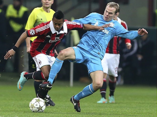 Milan forward Robinho shields the ball versus Zenit on December 4, 2012