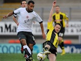 Accrington Stanley's Rommy Boco and Burton Albion's Lee Bell battle for the ball on December 9, 2012