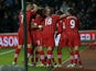 Southampton players mob Jason Puncheon after his strike against Reading on December 8, 2012