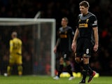 A disappointed Steven Gerrard leaves the field at half-time after scoring an own goal on December 9, 2012