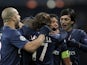 PSG players celebrate their goal against Porto on December 4, 2012
