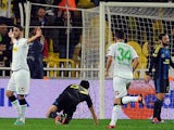 Borussia Moenchengladbach's Tolga Cigerci celebrates moments after netting a goal against Fenerbahce on December 6, 2012