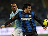 Lazio's Abdoulay Konko and Inter Milan's Diego Milito battle for the ball on December 15, 2012