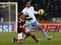 Bologna's Alessandro Diamanti and Lazio's Stefano Mauri battle for the ball on December 10, 2012