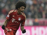 Bayern defender Dante rues a miss against Borussia Moenchengladbach on December 14, 2012