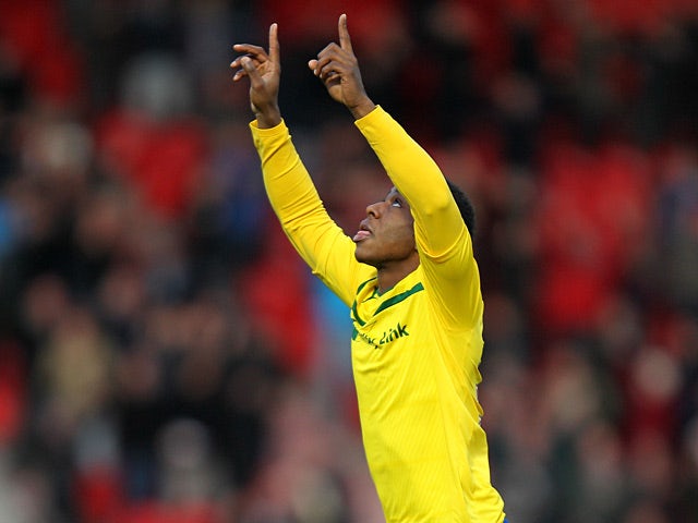 Coventry City's Franck Moussa points to the sky after scoring the opener on December 15, 2012