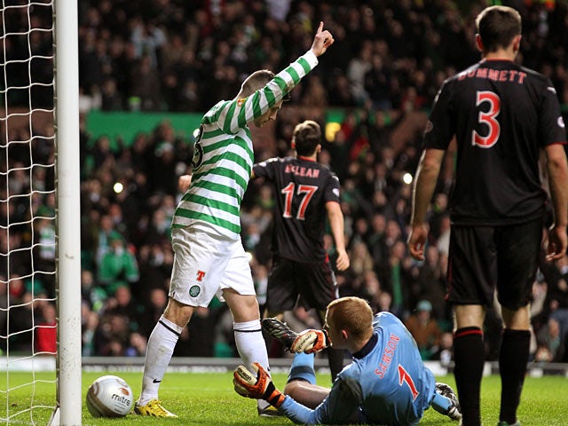 Celtic's Gary Hooper celebrates scoring his team's second goal on December 15, 2012