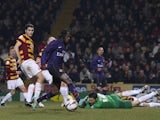 Arsenal's Gervinho misses from a yard against Bradford on December 11, 2012