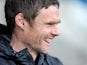 Fleetwood Town manager Graham Alexander smiles during the match against Gillingham on December 15, 2012