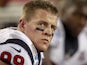 Defensive End JJ Watt looks on during the heavy loss to the Patriots on December 10, 2012