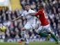 Kyle Walker and Wayne Routledge battle for the ball on December 16, 2012